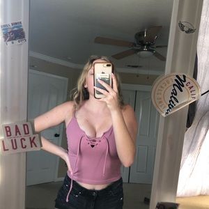 Pink ribbed top with cross design